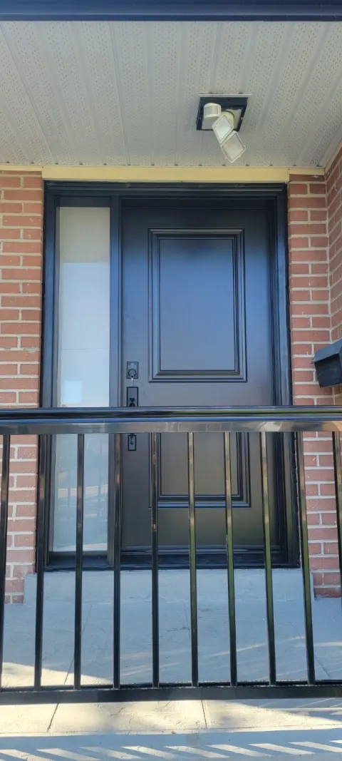 black entry door with sidelight